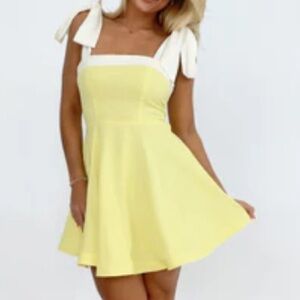 Yellow sundress. Never worn but I did take the tags off